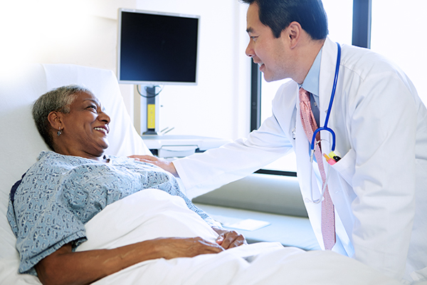 Bedside Physician with Patient